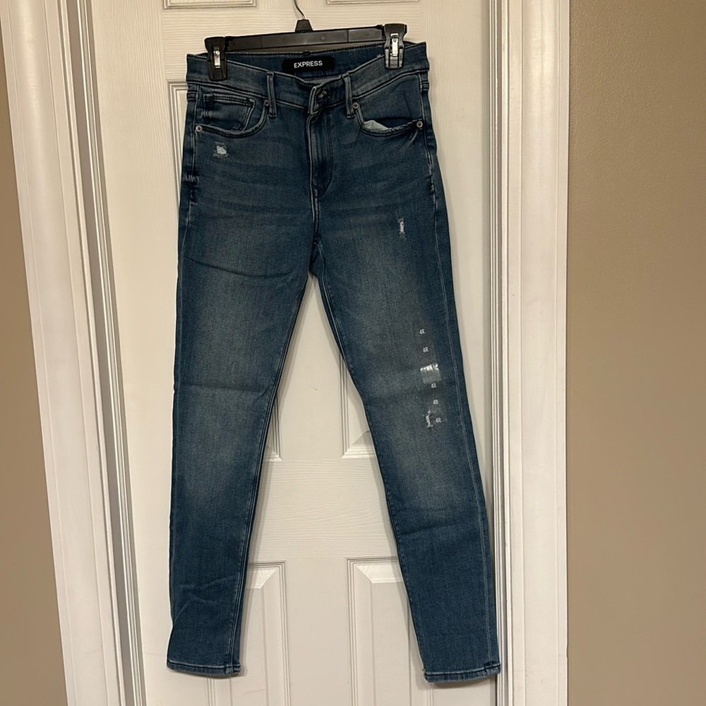 W express jeans. Legging mid rise. Stretch. Size 4R. Never worn.